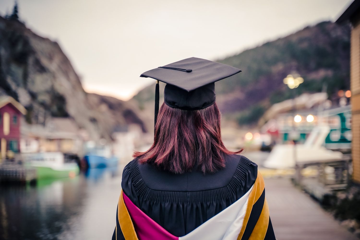 Graduation photo of MUN students in their gowns and caps during convocation at Quidi Vidi Village