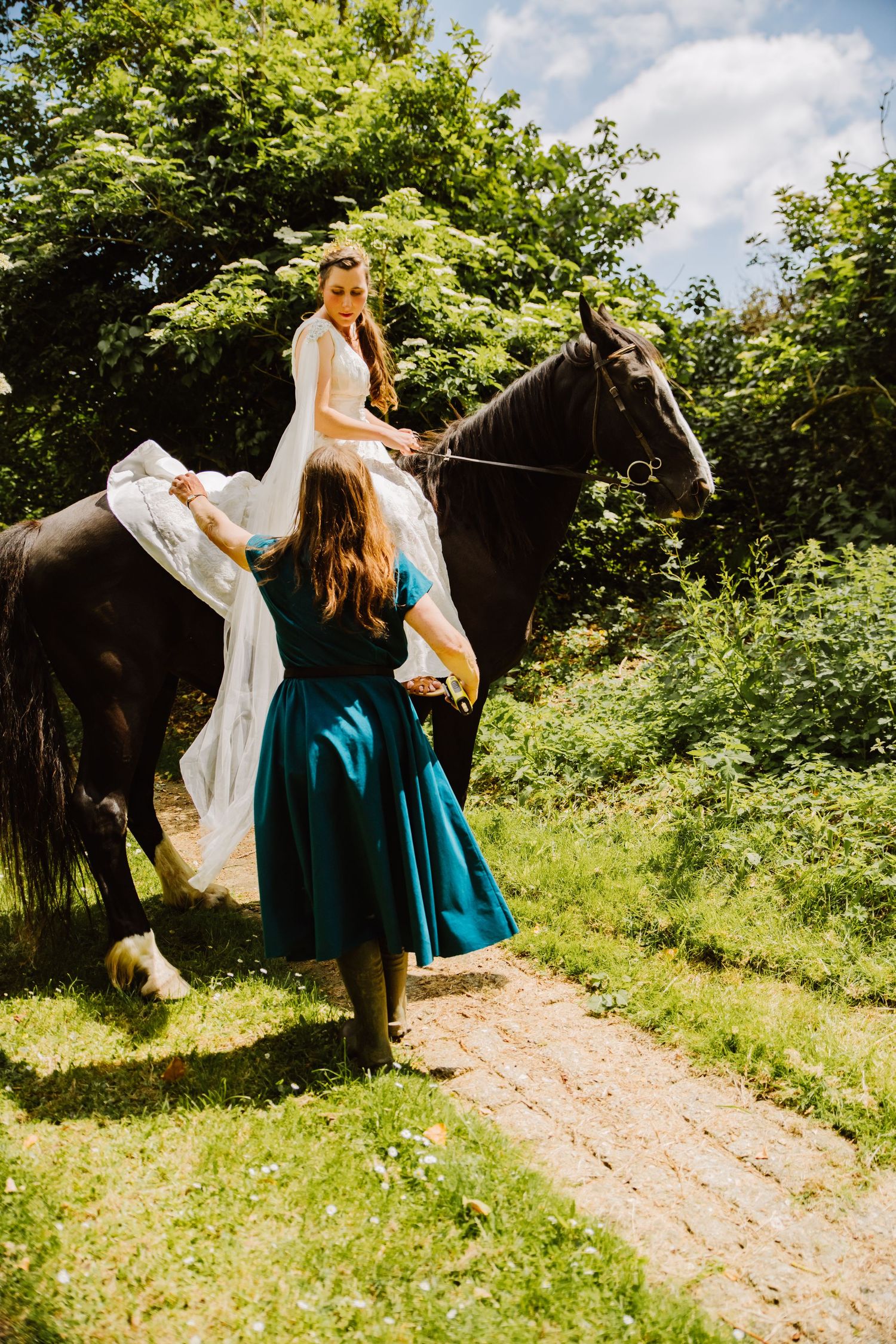 Bride on horse. Documentary candid  Wedding Photographer, Dorset Somerset, Devon. Bridport wedding photographer