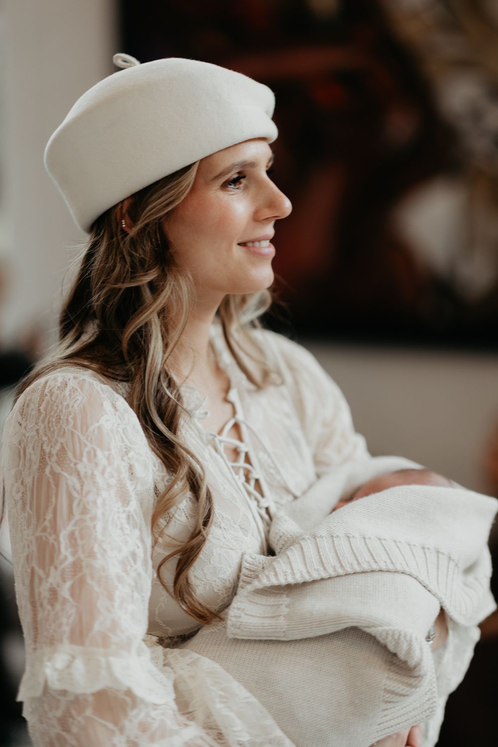A series of profile shots showing someone in a white lace dress and cowboy hat looking to the side.