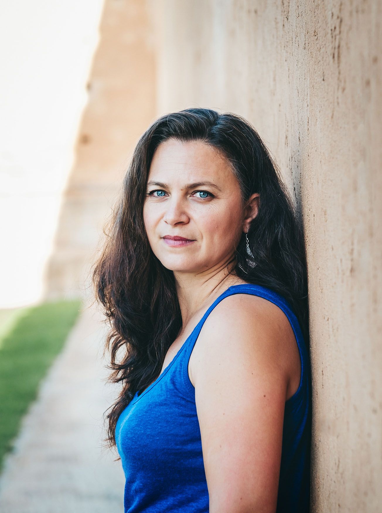 Portrait of a woman in blue, Natural light. Portrait Photography session. Outdoor photography