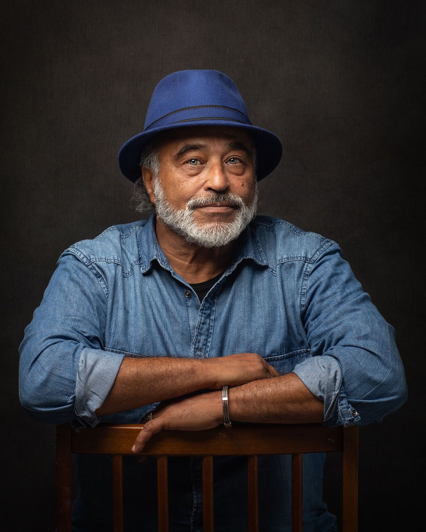 Portrait of a Man in a casual outfit, Studio photography. Dramatic lighting. Artist photography