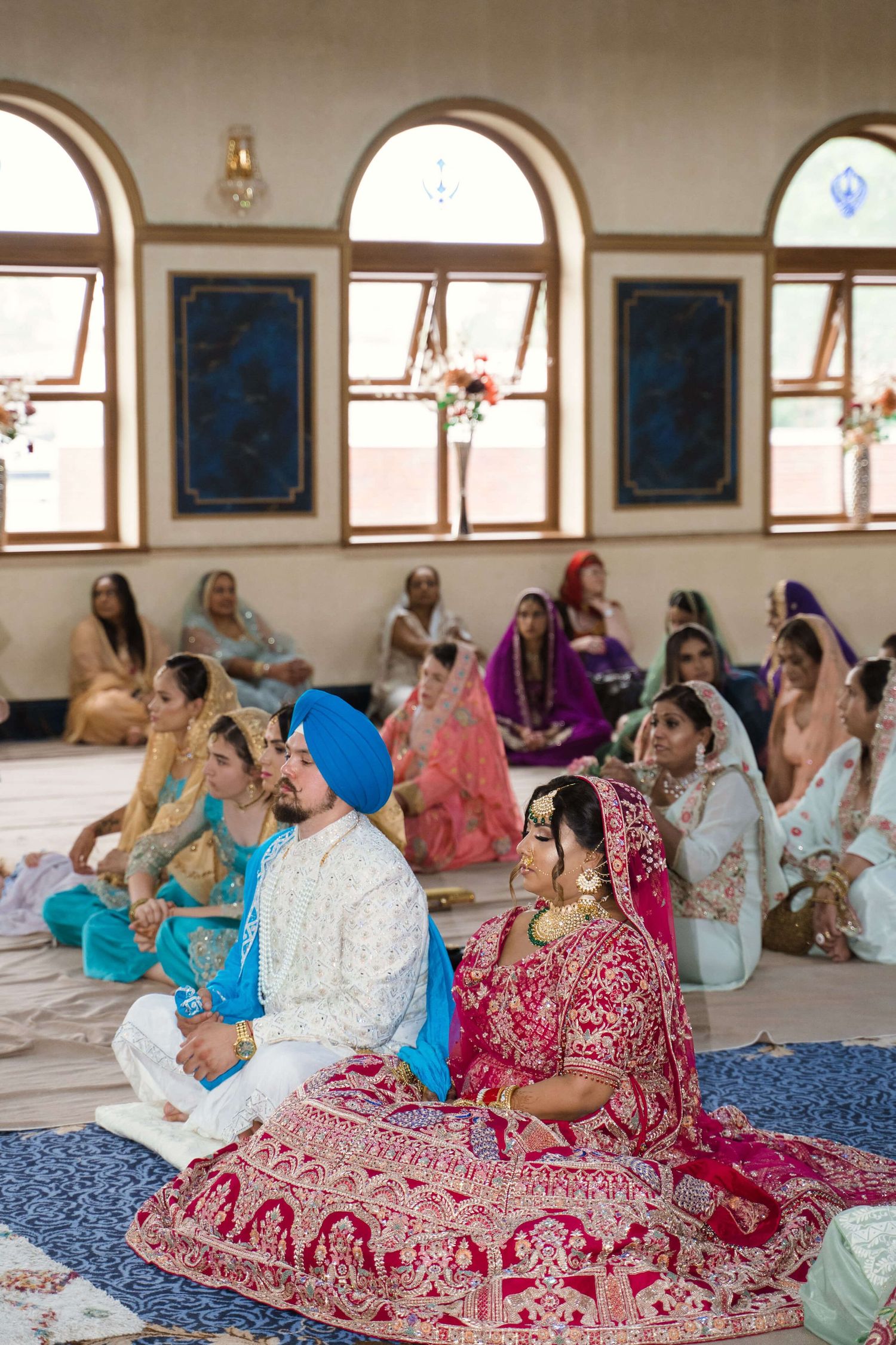 bride and groom to be in gurdwara awaiting their Anand karaj