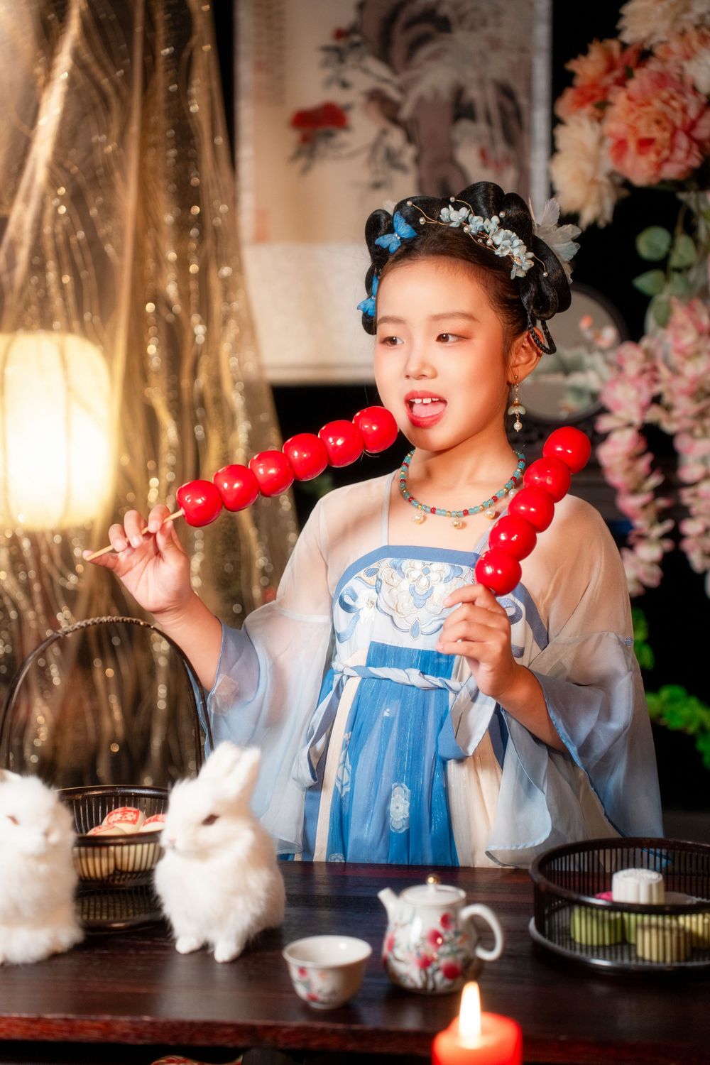Beautiful kids Tang Dynasty Hanfu studio photography with sparkling golden props, captured by Imagine Image Studio Auckland.