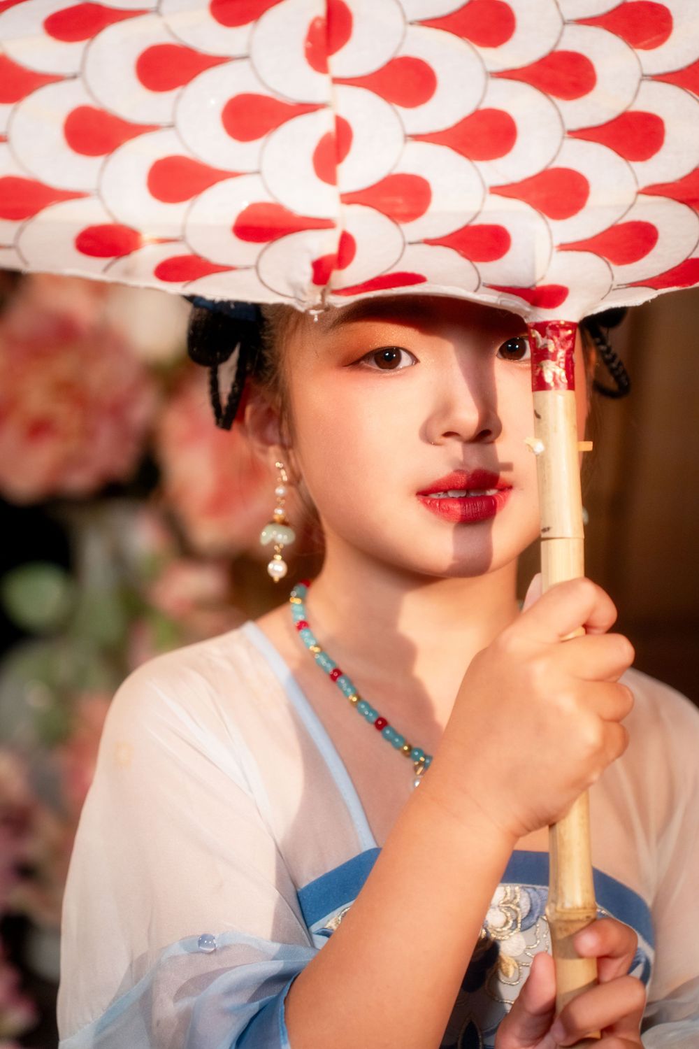 Cute children's studio portrait in an elegant Tang Dynasty Hanfu with dazzling golden props, by Imagine Image Studio.