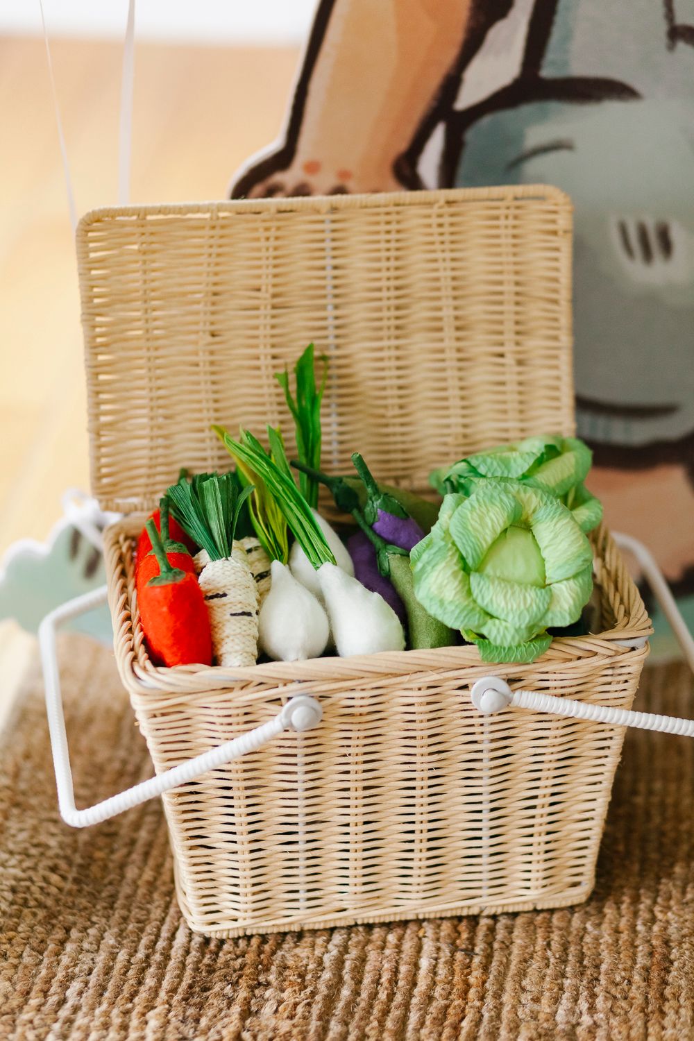 Close-up of basket with veggies, taken by NYC family photographer Paula Ortiz