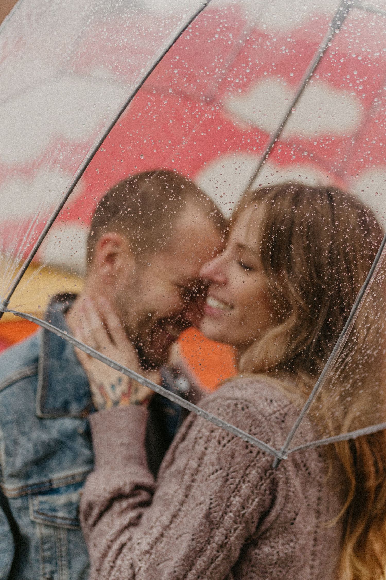 engaged couple posing in the a small town in north carolina