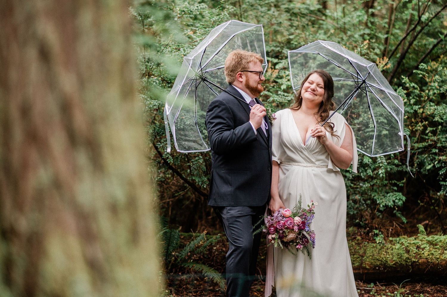 bride and groom on their rainy day elopement on Harstine Isalnd.