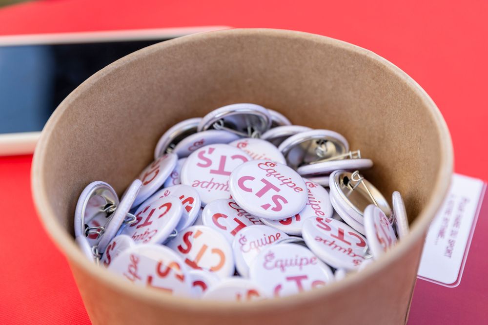 Sequence of photos showing a white paper-wrapped package or burger being unwrapped to reveal its contents.