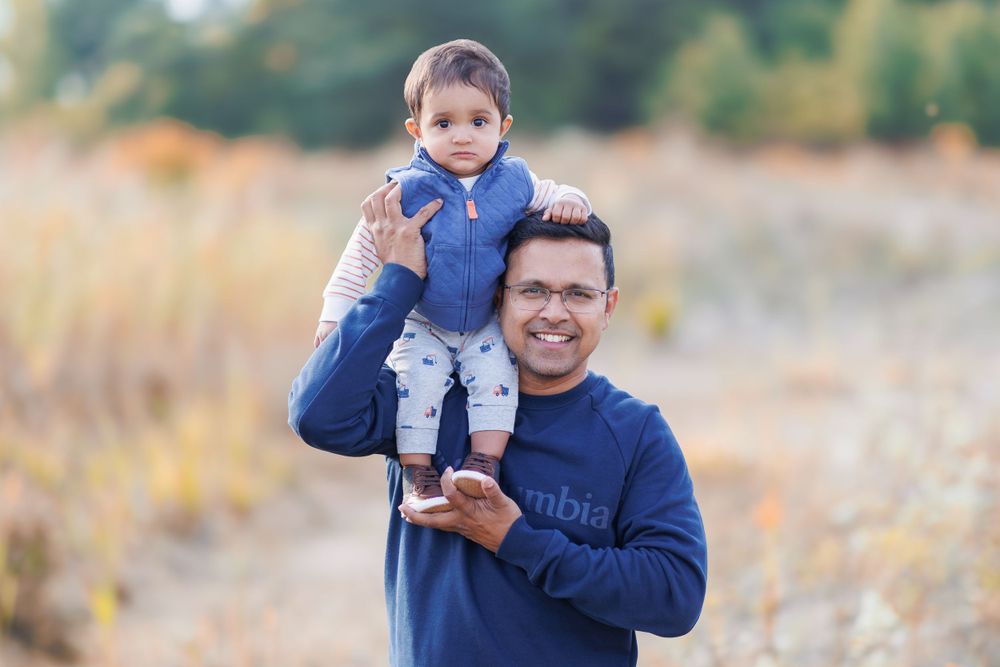A family captured in a series of candid autumn outdoor photos showing tender moments and interactions.