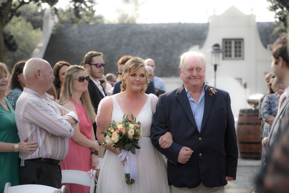 Bride to be and her father walking her down the aisle at her wedding, captured at the wedding shoot