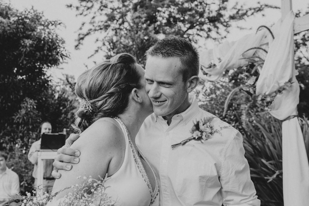 A quiet moment between the bride and groom at their wedding shoot