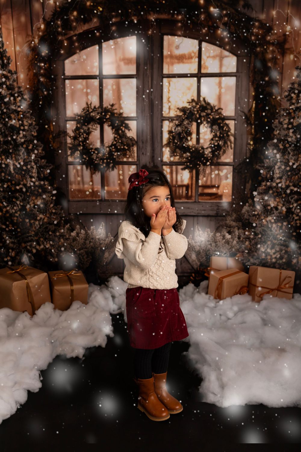 Winter wonderland setting with snow, brown paper packages, and Christmas wreaths in the background.