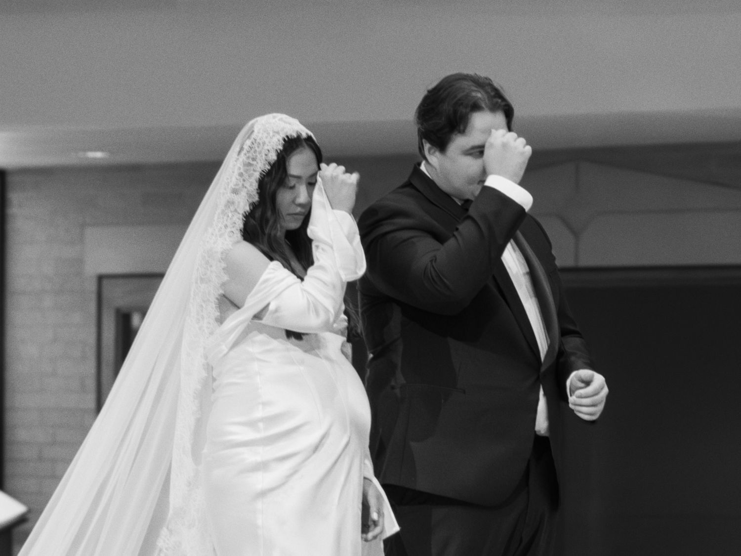 Close-up of bride and groom in emotional hug - romantic and cinematic