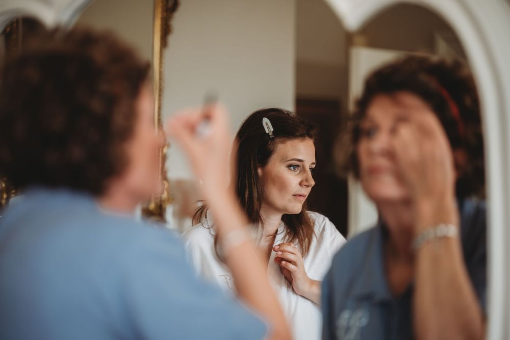A quiet behind-the-scenes moment during wedding preparations.