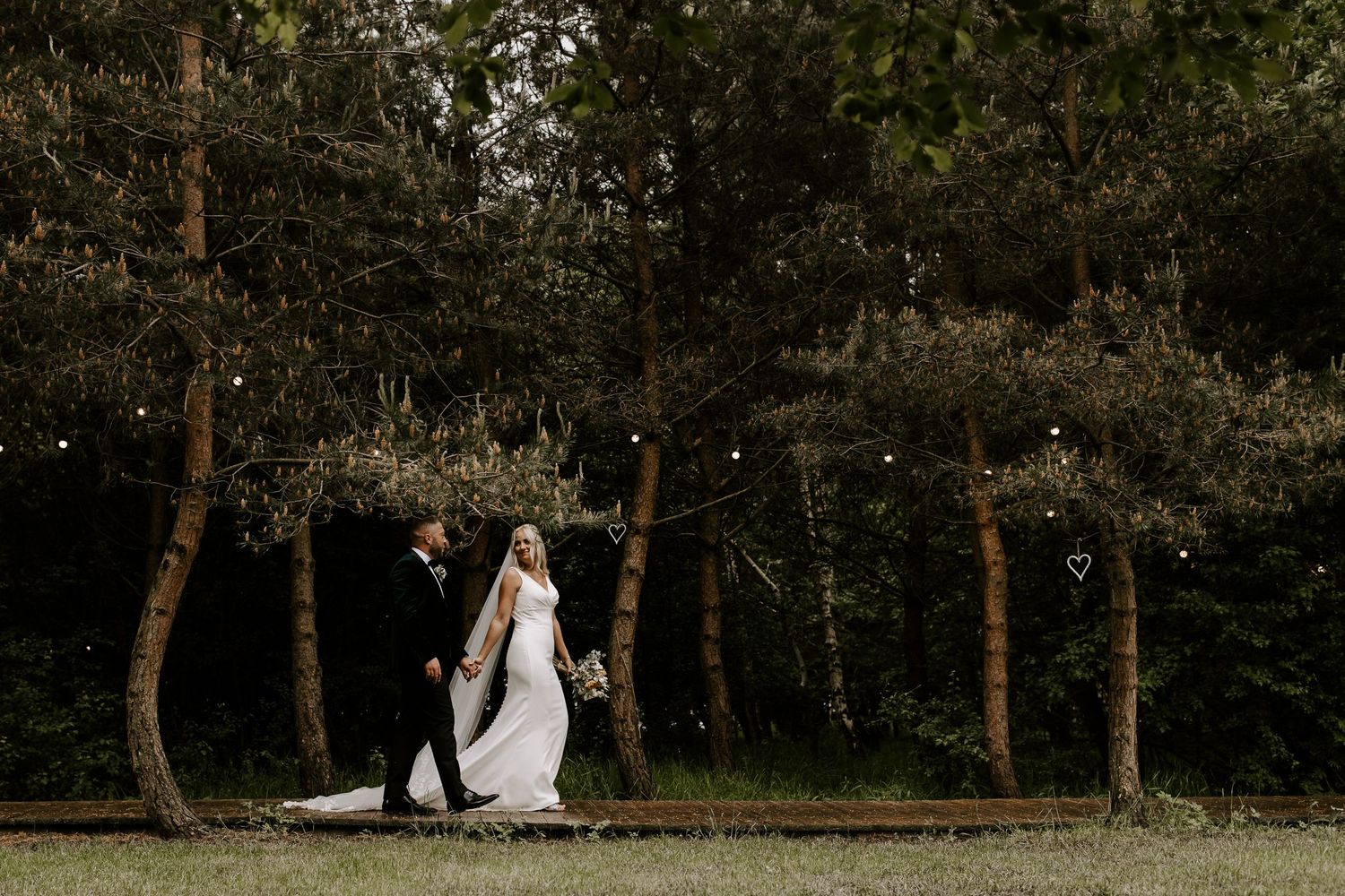bradbury glade wedding couple walking to the tipi