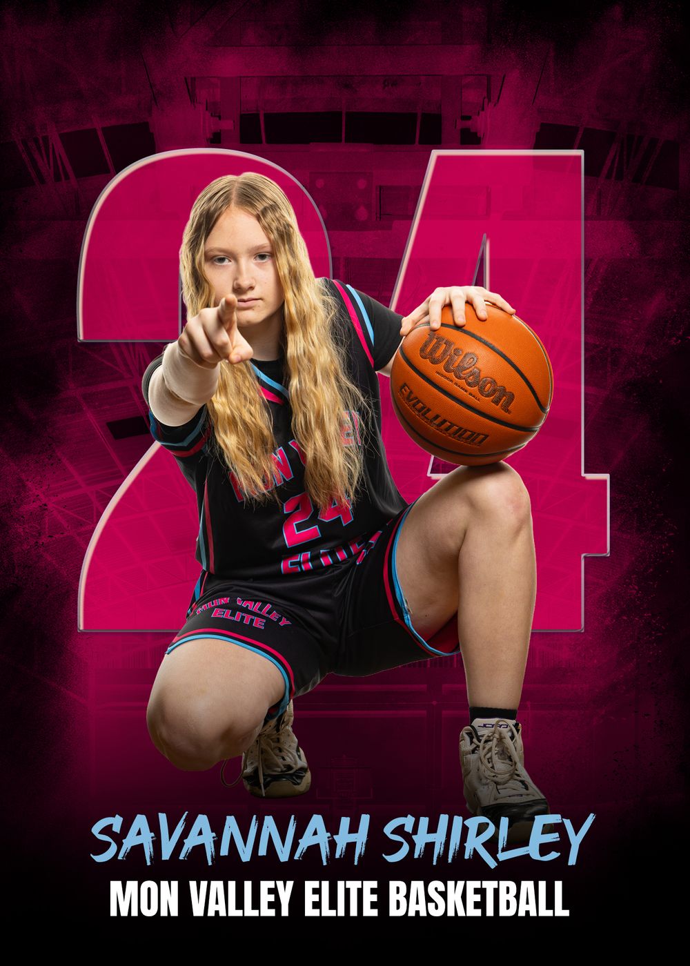 Basketball player in black jersey number 24 poses in crouched position with ball against pink backdrop with smoky effect.