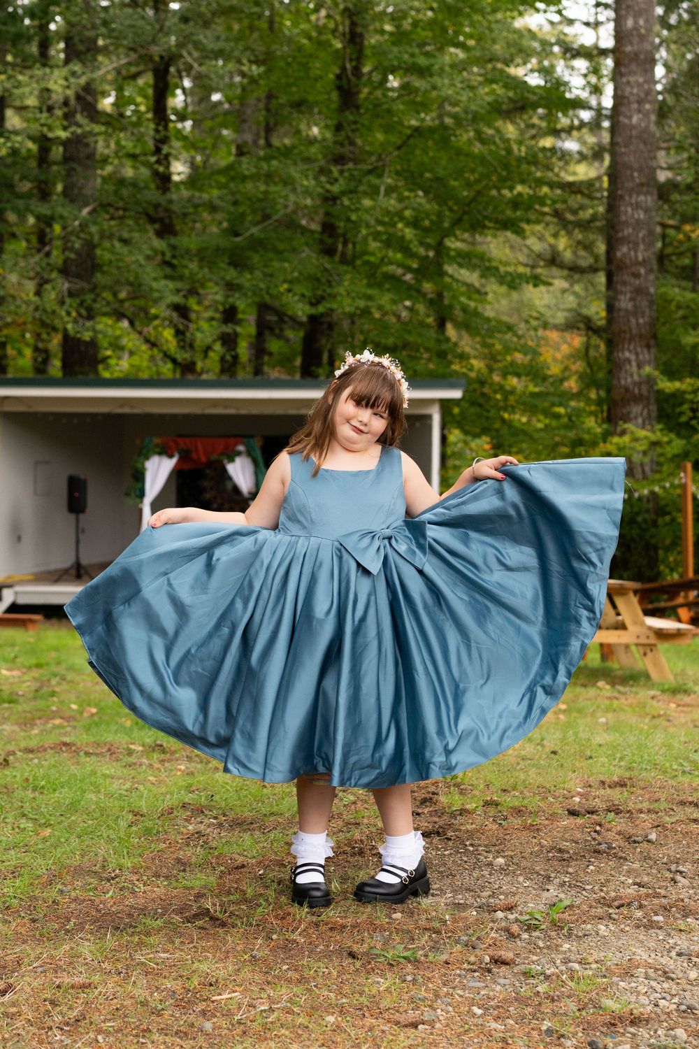 Daughter of the bride in a blue dress captured by Savvy Photography - Seattle Wedding Photographer