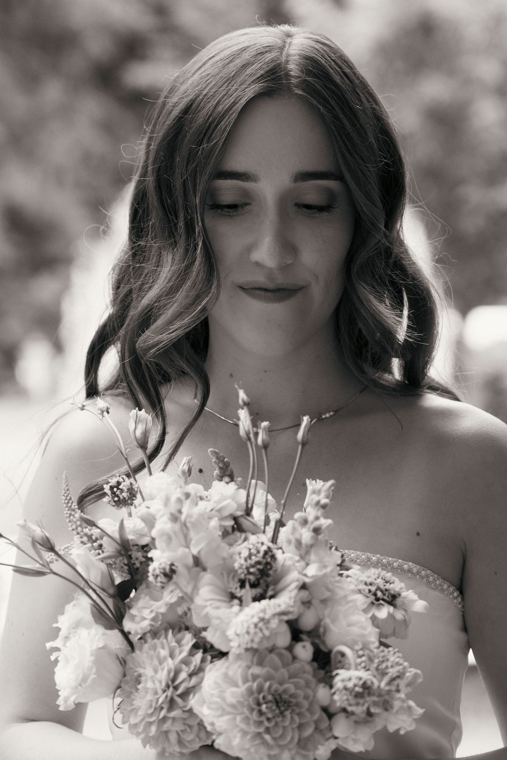 Black and white close up photo of bride and her bouquet captured by Savvy Photography - Seattle Wedding Photographer