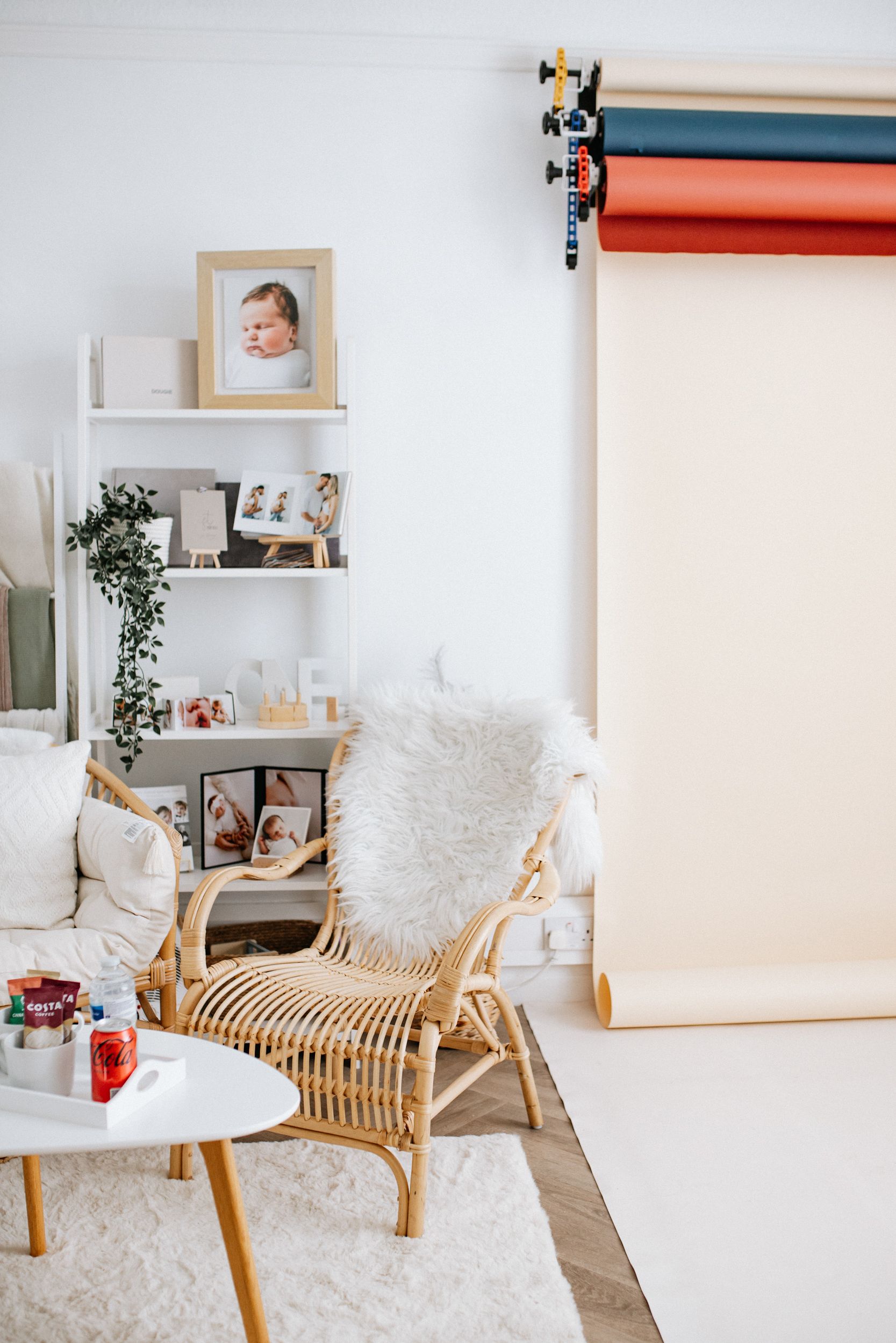 Mansfield photography studio with coloured backdrops and rattan furniture