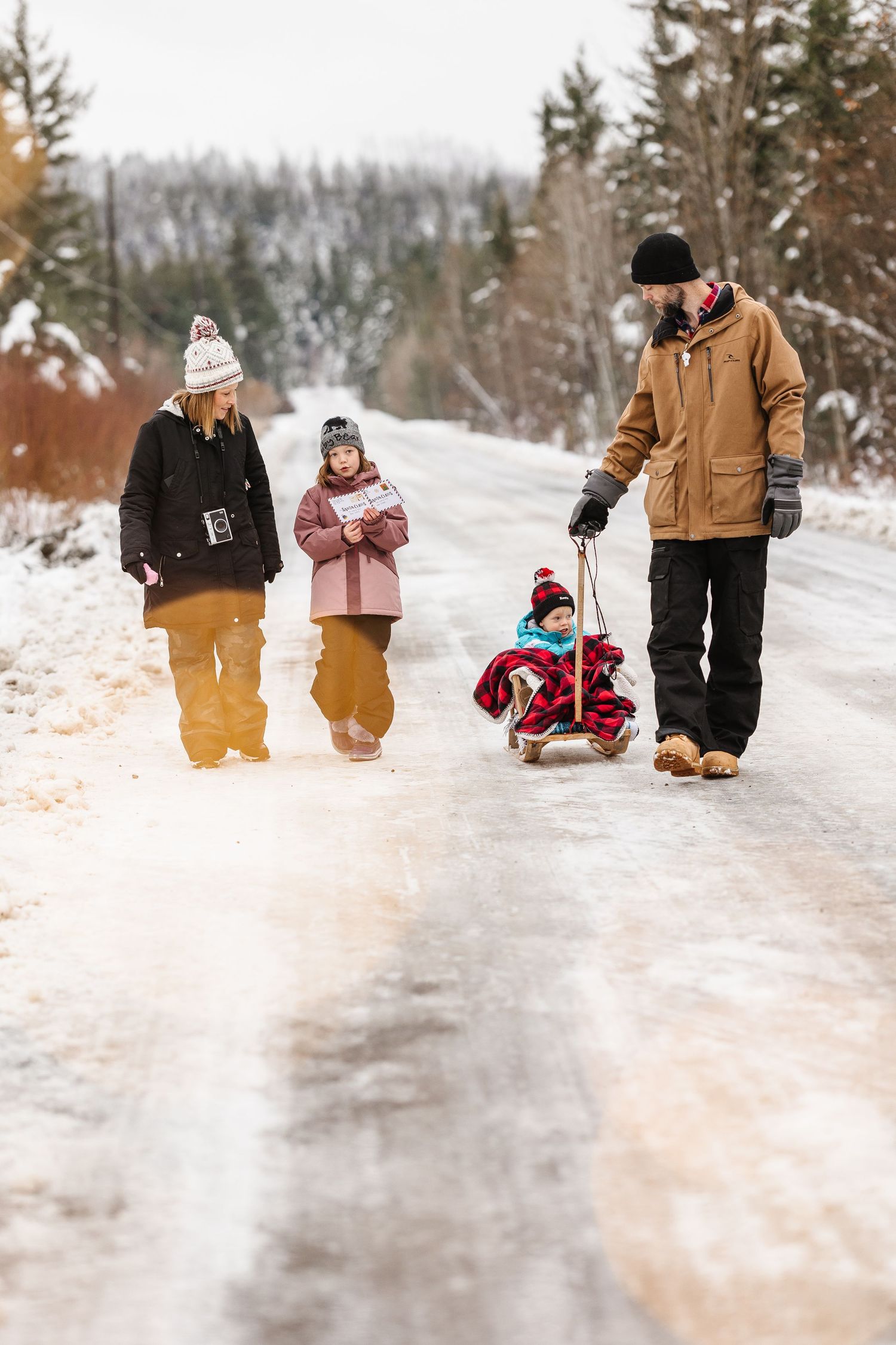 A collection of winter scenes showing people walking and playing in the snow while wearing warm brown and black coats.