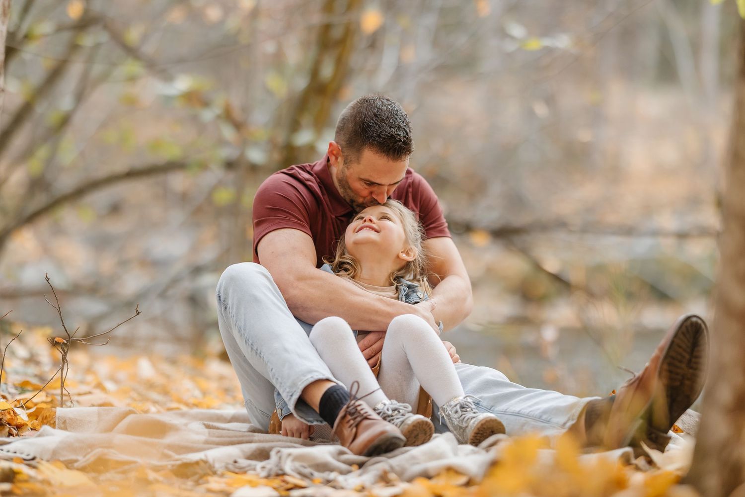 A series of autumn photos showing someone sitting in fallen leaves and taking photos with a camera.
