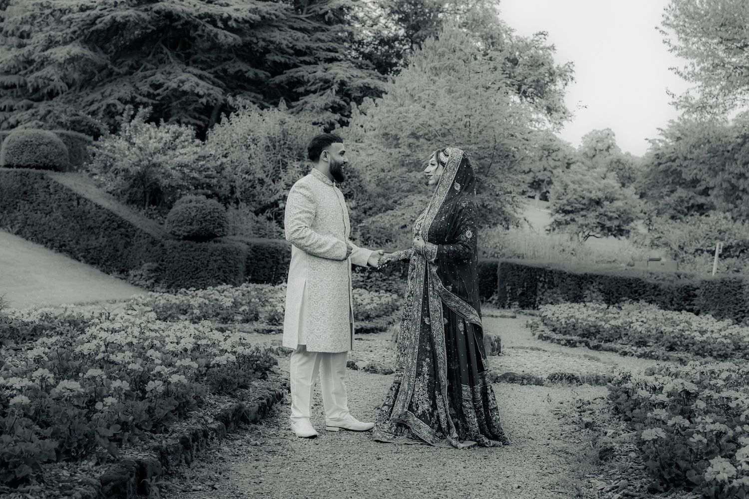 Black and white wedding portrait in the gardens