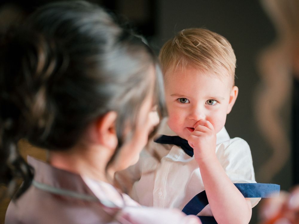 Intimate candid moments captured during wedding reception celebrations.