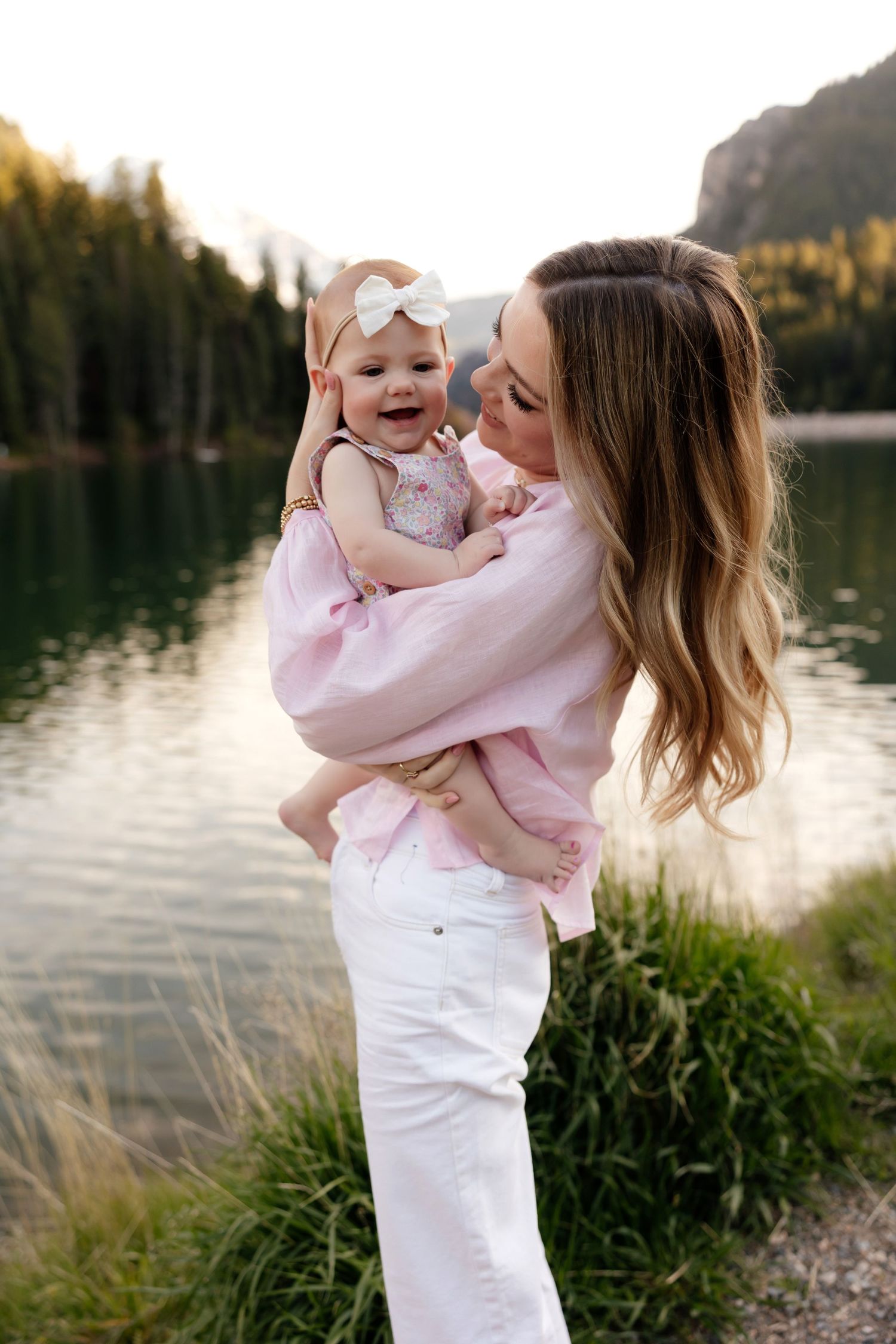 utah newborn and family photographer in studio with mom, dad, and baby at photo studio in Salt Lake City utah