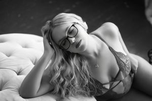 Florida boudoir photographer specializing in dark, cinematic, body-positive boudoir portraits.