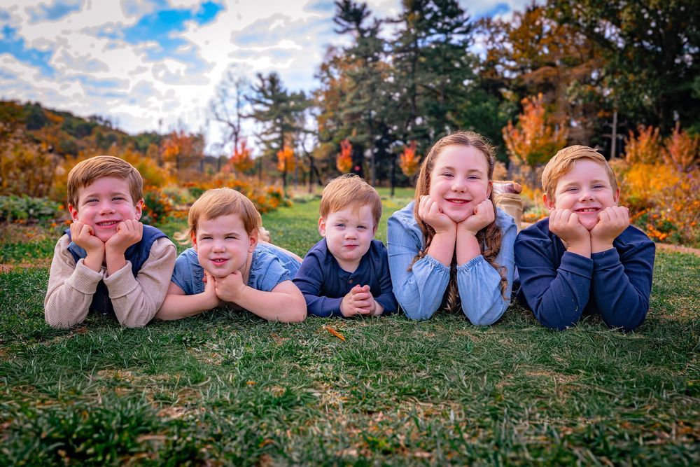 Picture-perfect family portraits with beautiful colors and genuine connection — captured in the most flattering light.