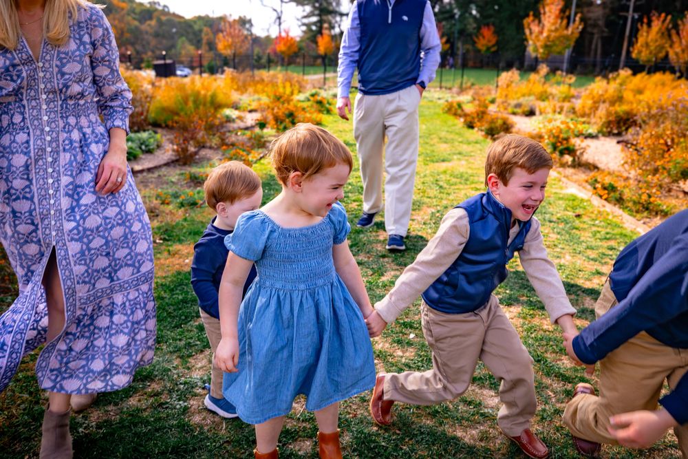 So much laughter, movement, and genuine fun — the perfect family portraits with gorgeous color and natural smiles