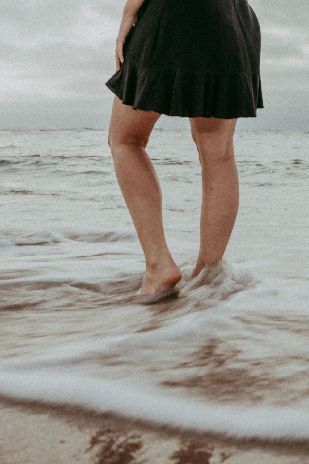 beach portraits in Swakopmund Namibia, moody and grainy. Details