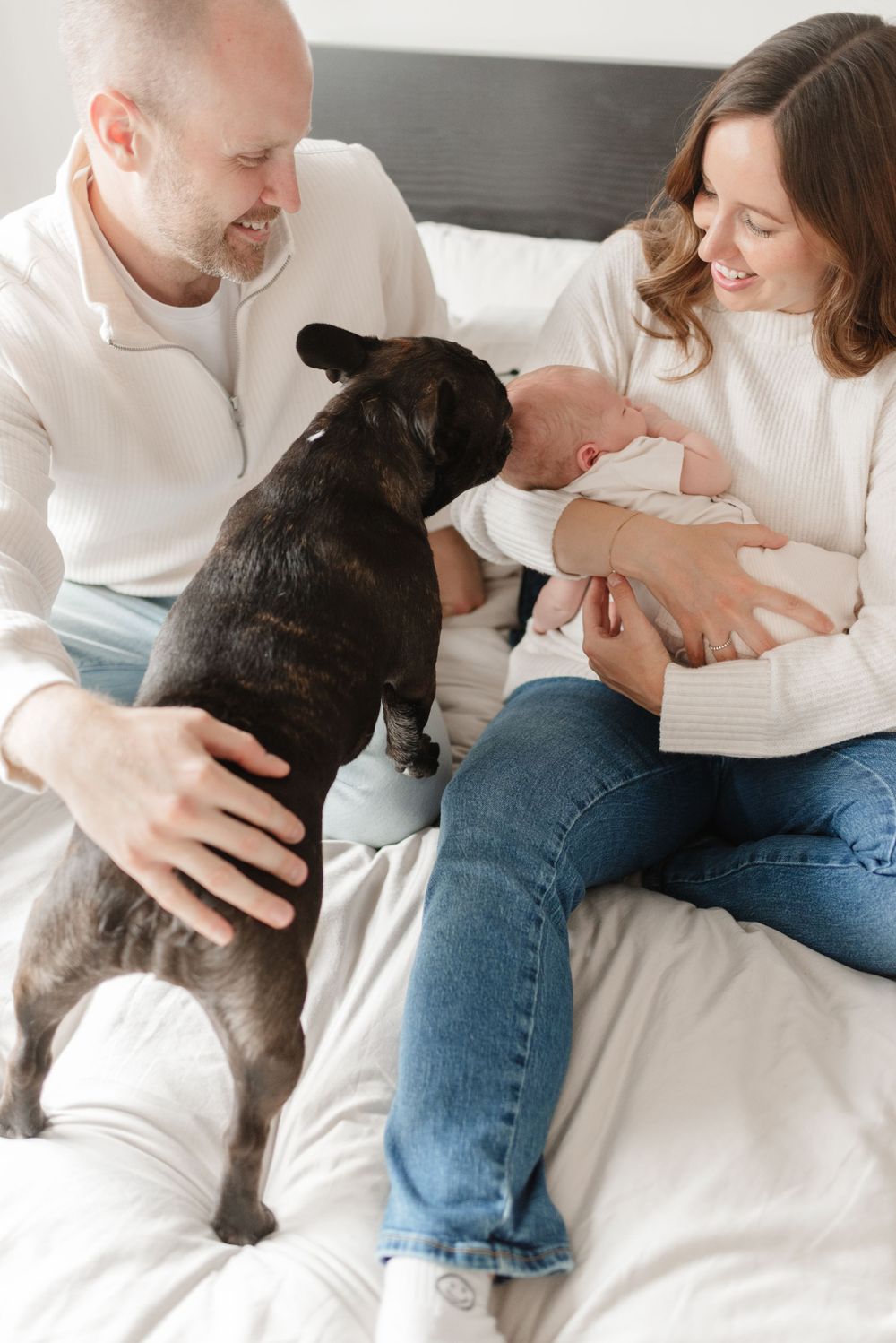 Dog observing newborn baby at toronto newborn session in home, captured by Jess GC Photography, toronto's best newborn photographer