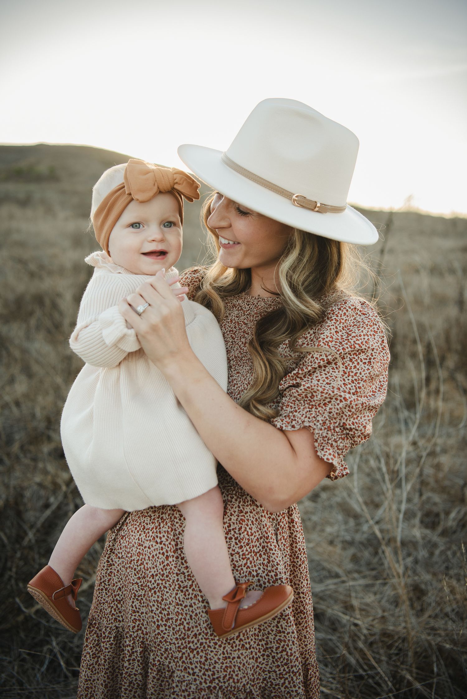 fall sunset with a mother and daughter having a special moment
