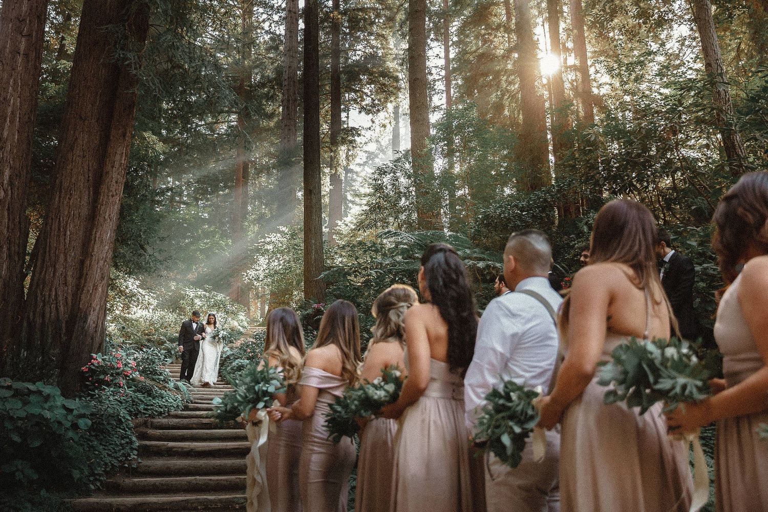 Bride's father walking her down the aisle during a wedding ceremony in Nestldown, California