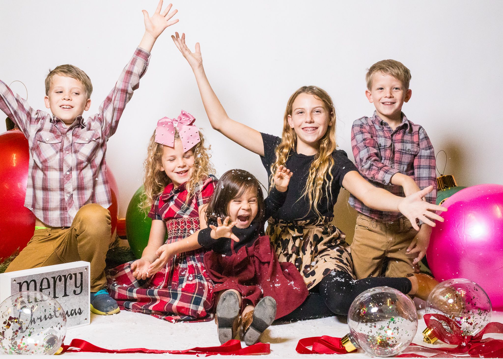 The joy Christmas brings to the love of a family is...priceless. -Winter Fest Mini Shoot