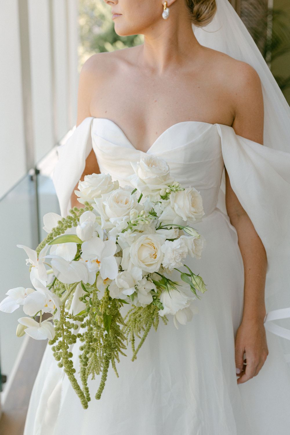 Bridal gown, bouquet and details. Clean look.
