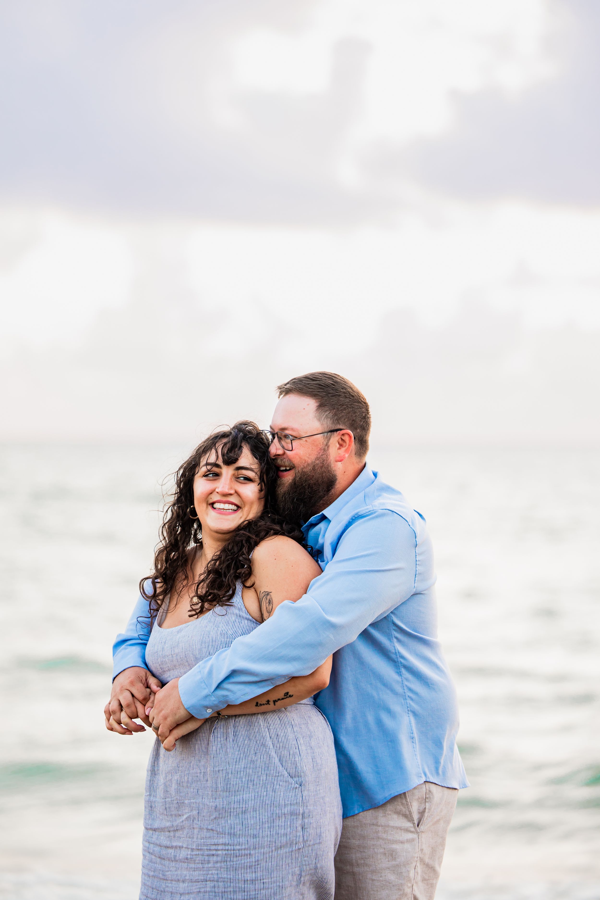 Happy couple photographed at Stuart Beach