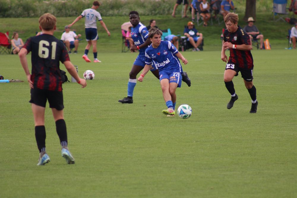 Soccer sense, hockey sense...you got to know where to go. Passing is key just like this pass at USA Cup in Blaine, MN.