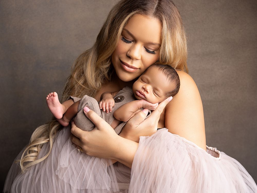 A series of gentle, warm-toned portraits showing tender moments between parent and infant.