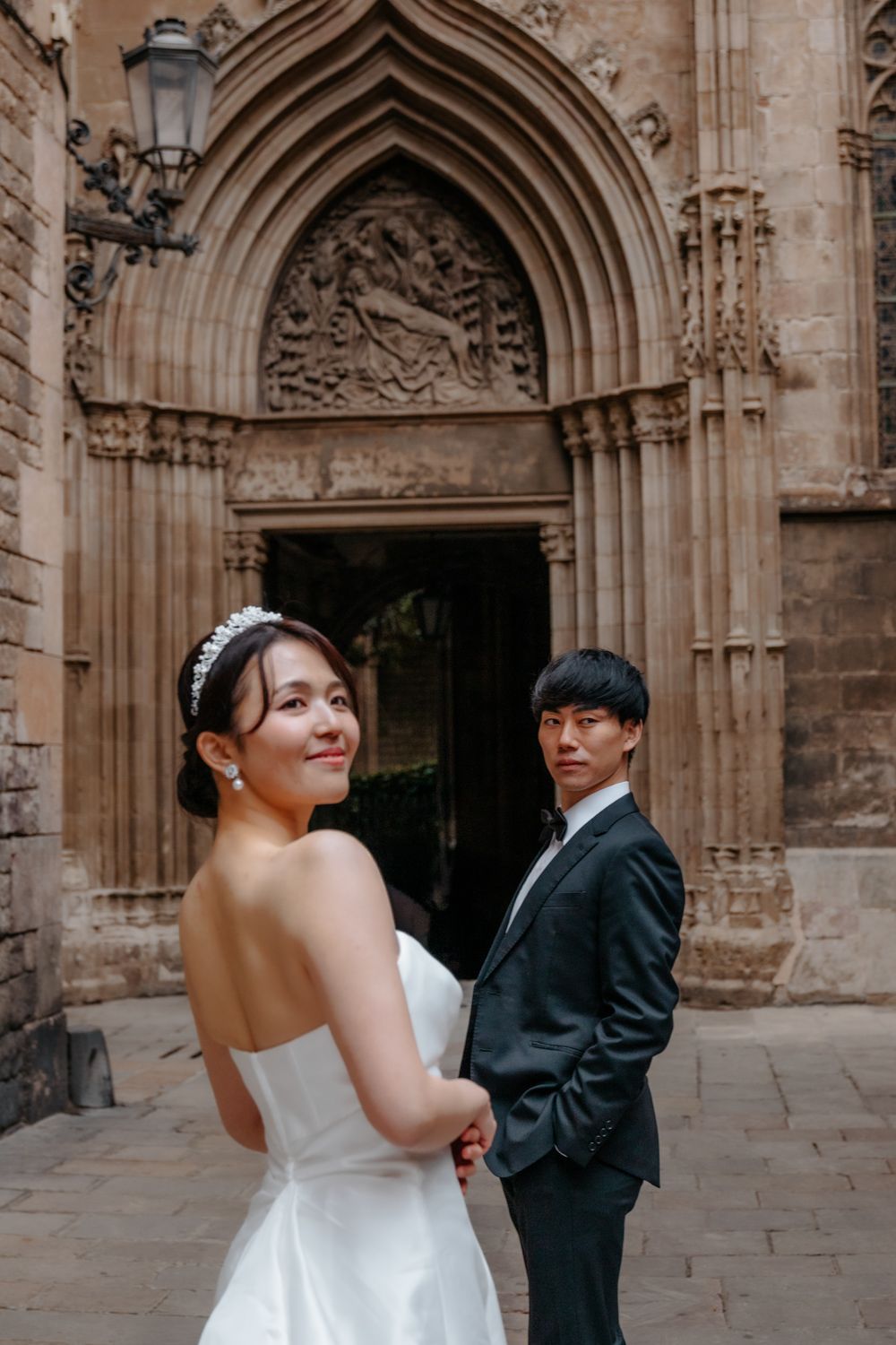 Playful kiss on Gaudí ceramic bench Park Güell Pre wedding photoshoot Barcelona BarcelonaLoversPH