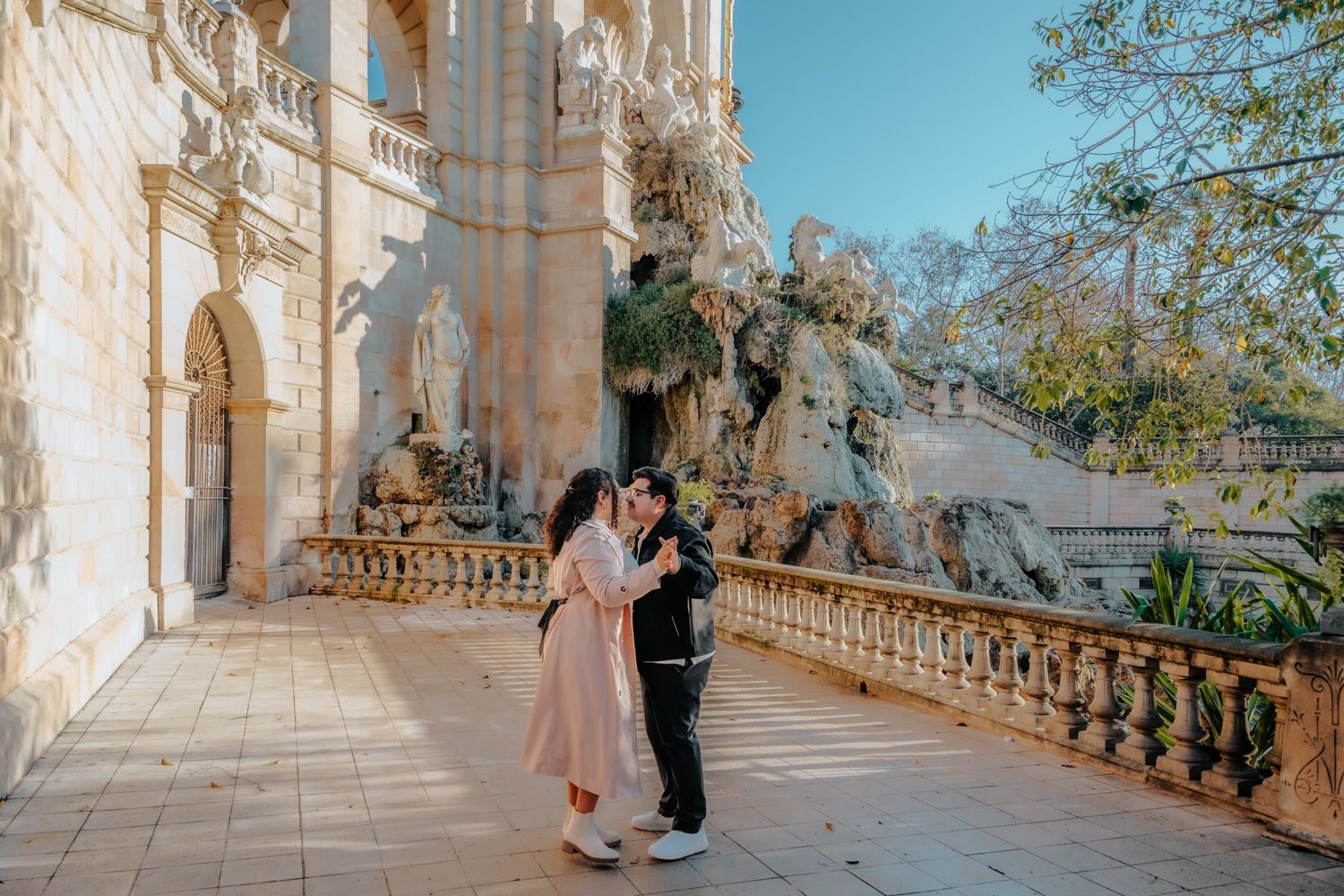 Loving hug near palm trees Ciutadella Park Surprise proposal Barcelona BarcelonaLoversPH