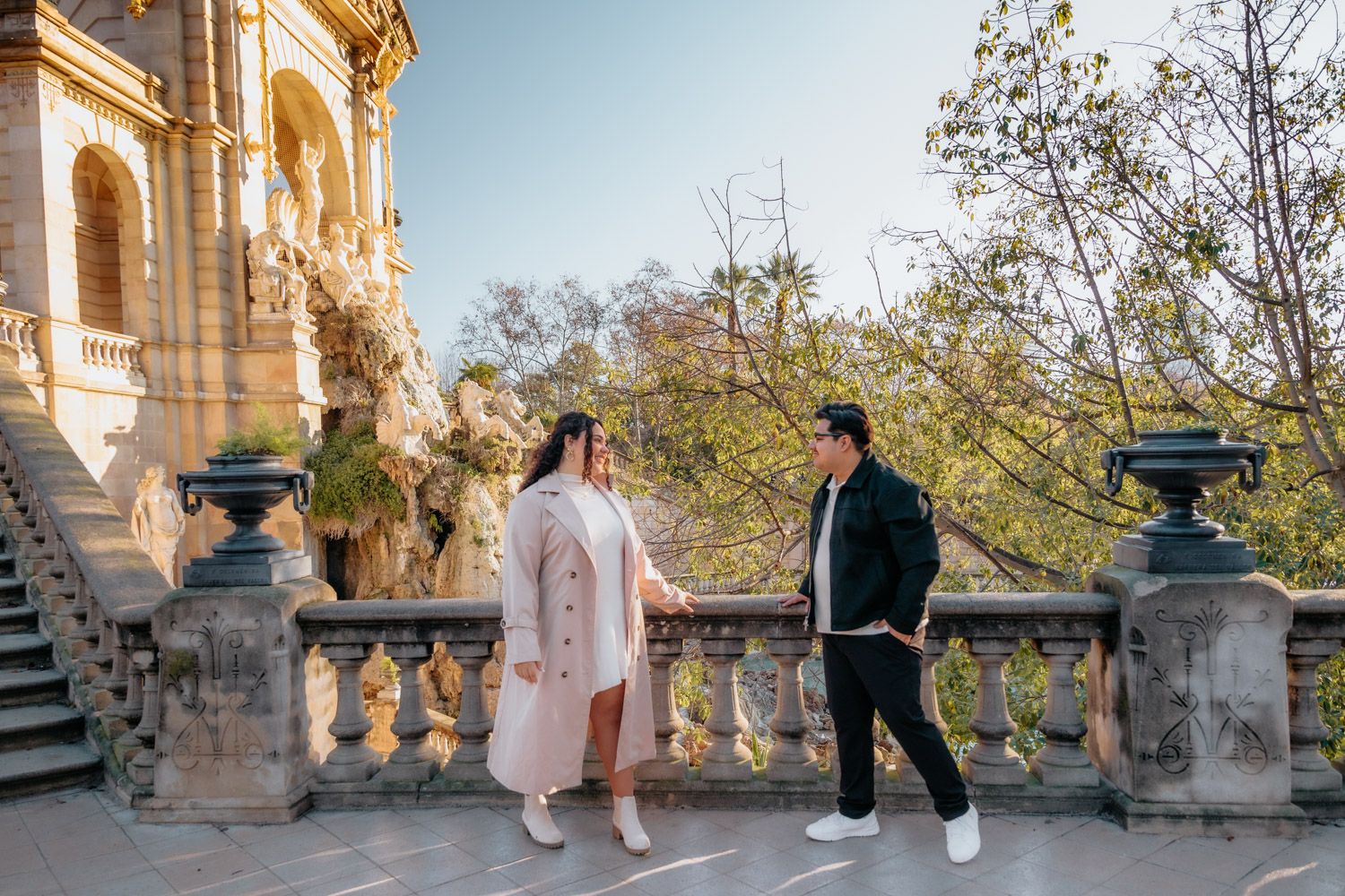 Loving couple sunrise reflection near fountain Barcelona Surprise proposal Barcelona BarcelonaLoversPH