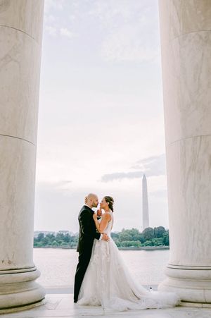 A romantic wedding photo sequence at the Jefferson Memorial with white marble columns framing the elegant scene.
