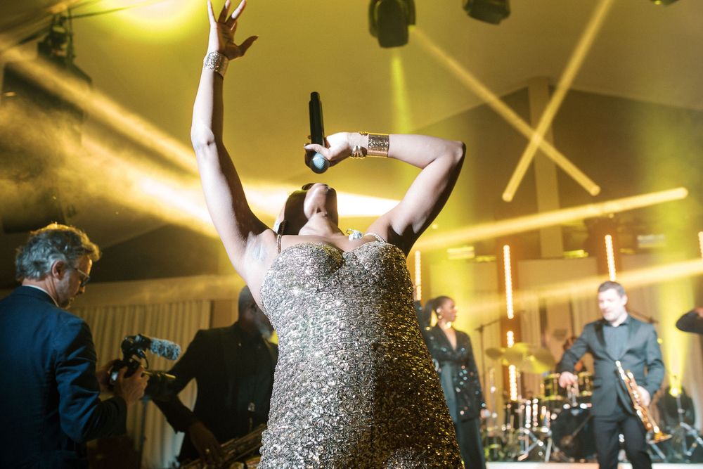 Live performance energising guests at Palácio do Correio-Mor during Indian destination wedding in Portugal