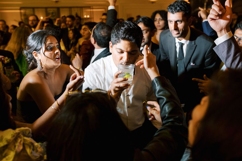 groom at the heart of the celebration at Palácio do Correio-Mor, Portugal wedding photographer capture