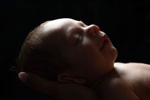 newborn session sleeping baby backlit detail shot