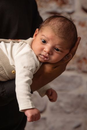 Newborn baby with parent
