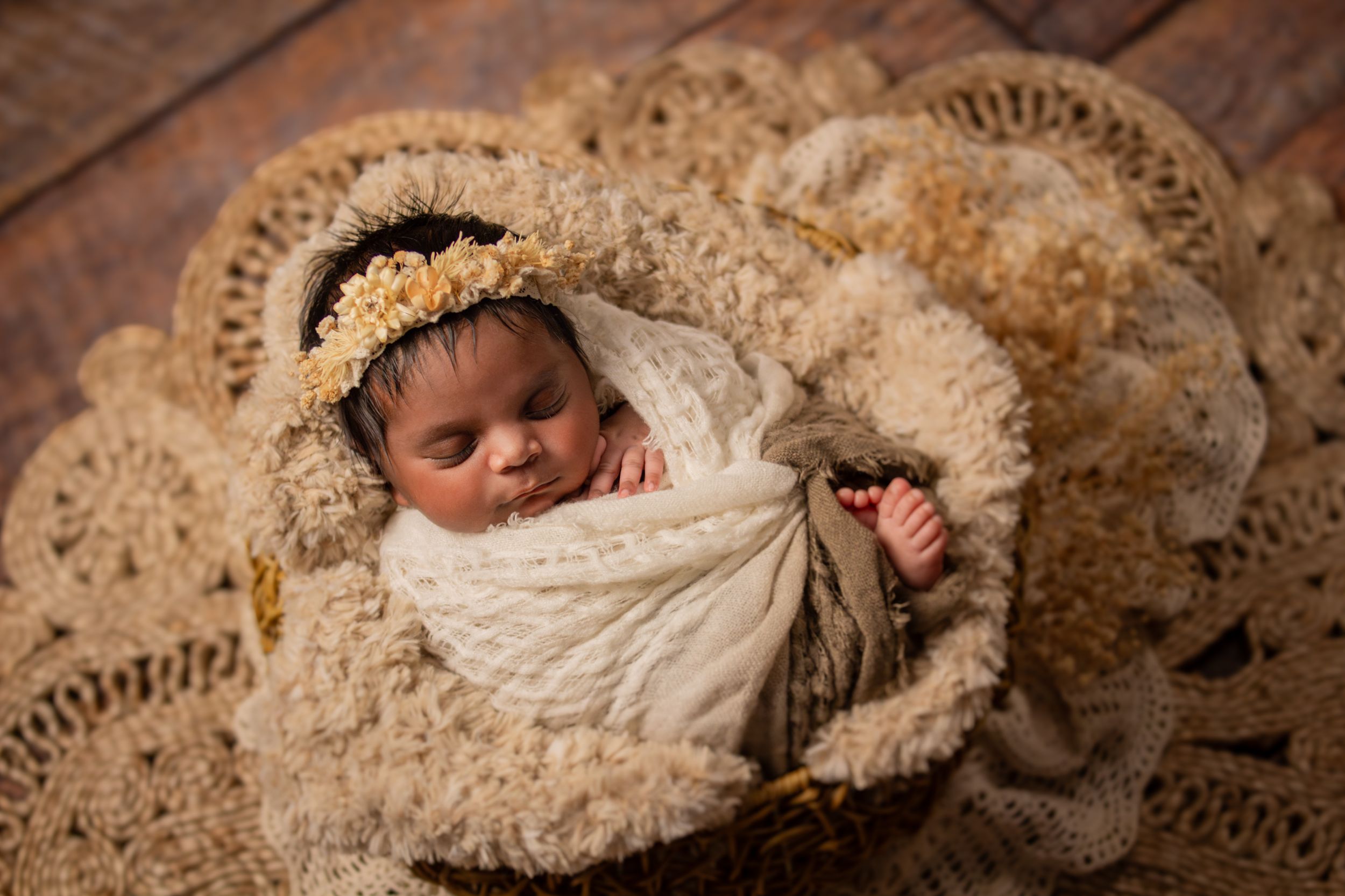 newborn session sleeping baby boho styling neutral colours dried flowers handmade tieback