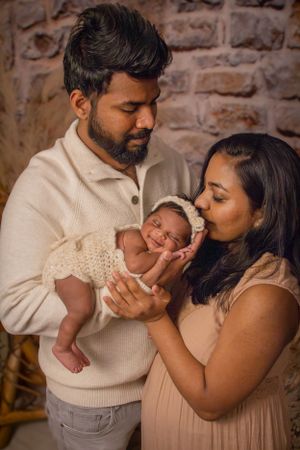 Newborn baby with parents GTA Studio